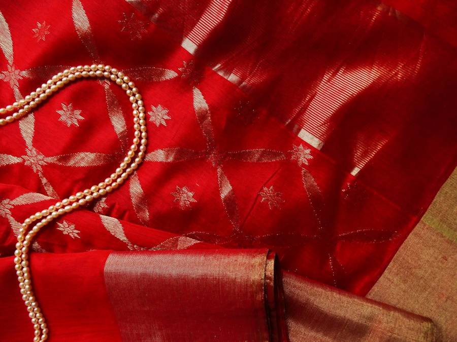 Red silk with a string of pearls