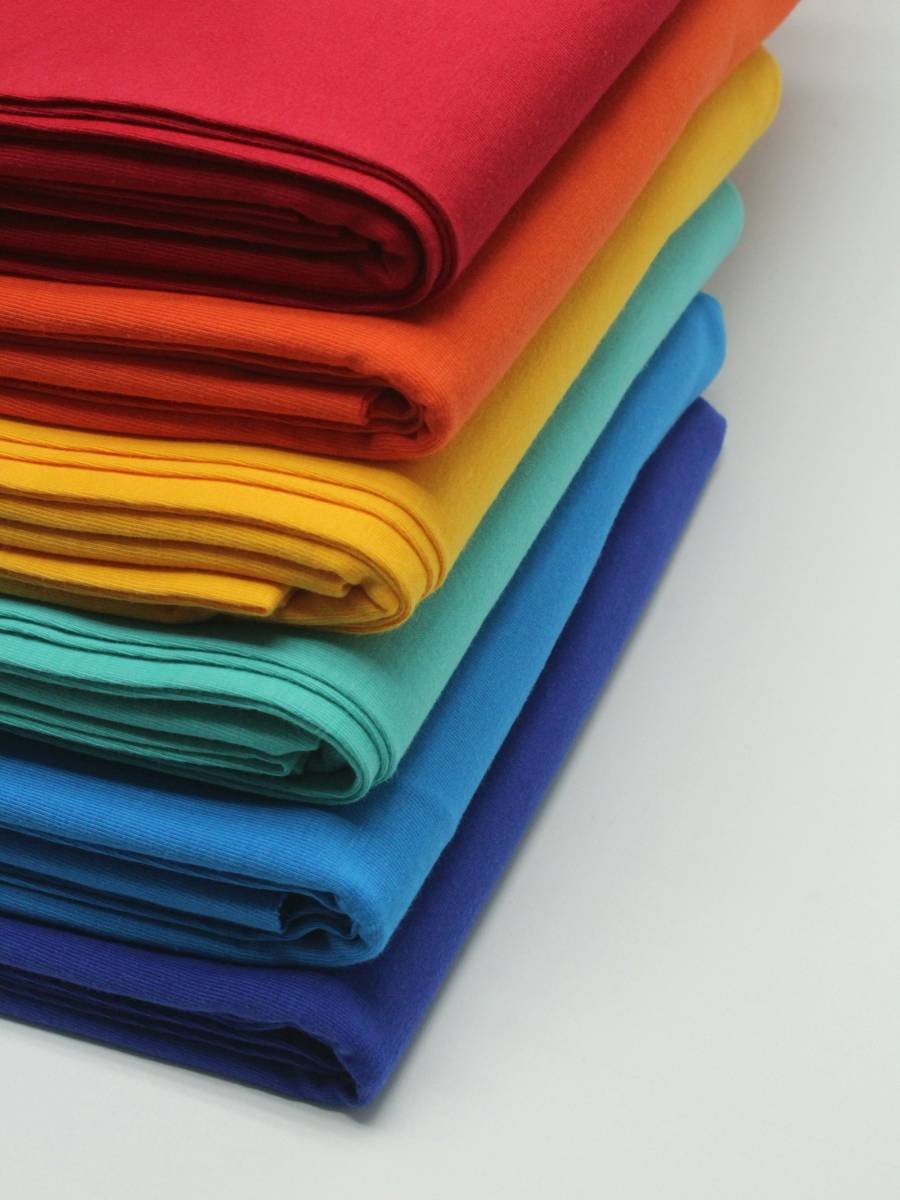 Stack of brightly coloured fabric