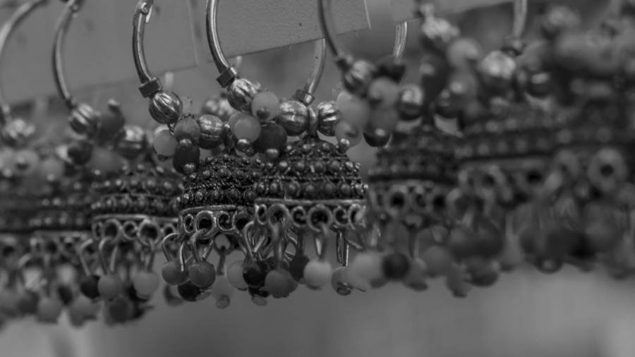 Rows of ornate jhumka earrings