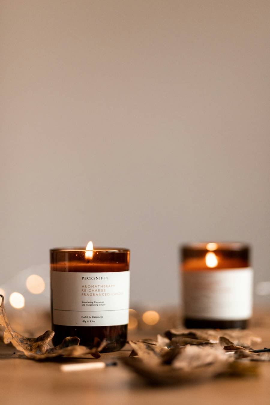 Two amber glass candles