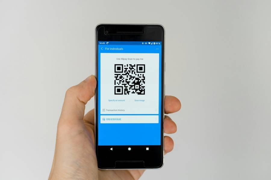 Phone showing a QR code for payment